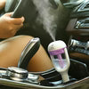 Mini car humidifier diffuser in use inside vehicle providing moisture and aromatherapy while driving